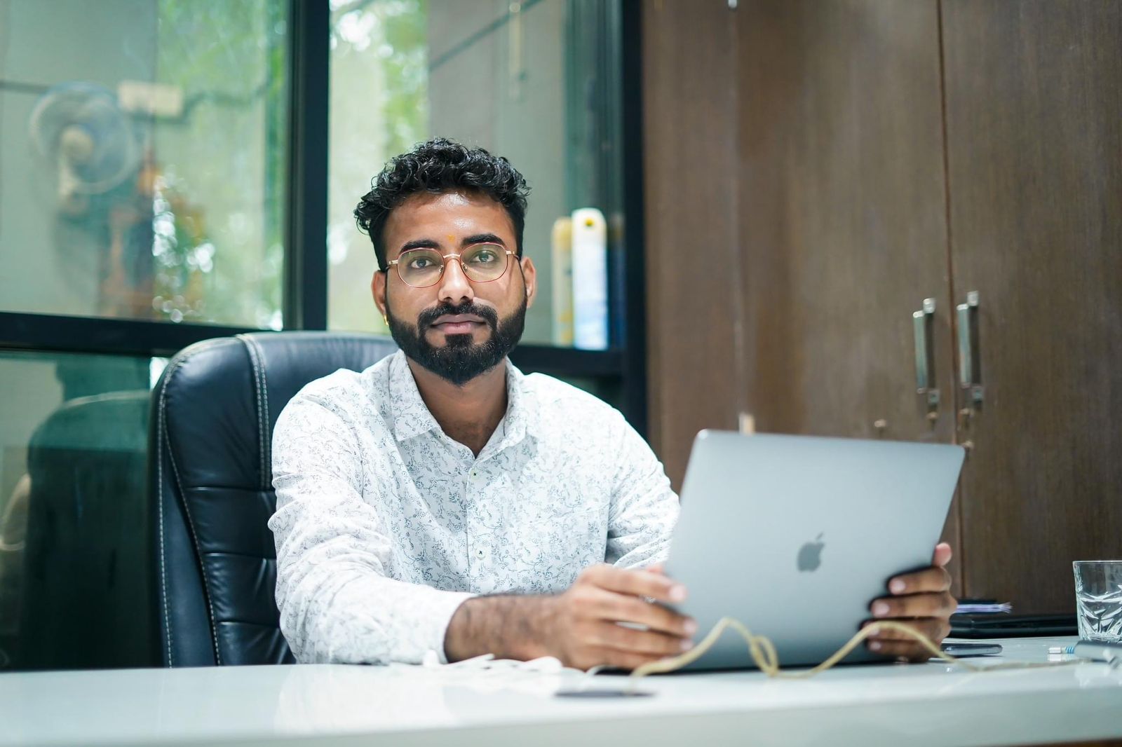 Shani Diwakar working at his desk